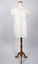 Back view of cream-colored chemise on mannequin