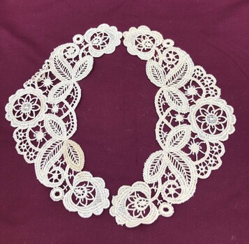 Front view of two halves of lace collar
