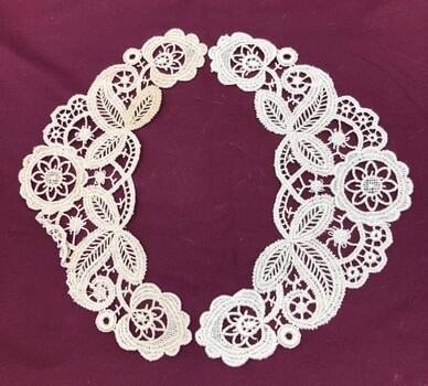 Back view of matching halves of lace collar. Slight discoloration on one.