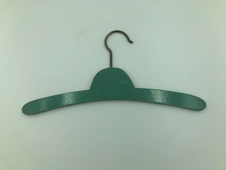 Green colored wooden hanger, child size, laid flat.