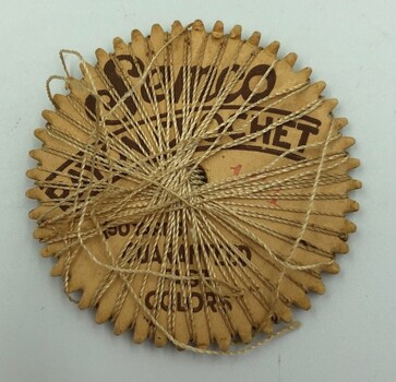 Semco Rayon Crochet wheel with Semco label visible. Gold thread.