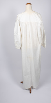 Back view of long cream-colored nightdress.