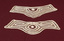 Matching lace cuffs with one cuff having a more rounded end.