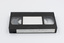 Top side of VHS tape with label visible on edge.