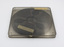 View of top of clear plastic film case showing label and film inside.