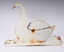 Front view of metal swan showing attachment hole in the centre.