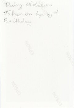 Image depicts the inscription on the back of that photograph reading, "Ruby Nobelius. Taken on her 21st Birthday".