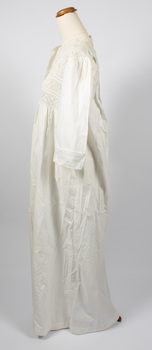 Side view of long, white cotton nightie on mannequin