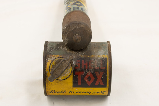 Front of barrel and plunger. Lettering visible on barrel.