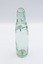 Empty glass bottle with Codd Neck design and a glass marble visible in the neck.