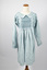 Front view of dress showing extensive smocking