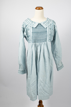 Front view of dress showing extensive smocking