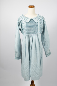 Front view of dress showing extensive smocking