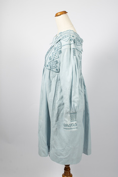 Side view of dress with long sleeve