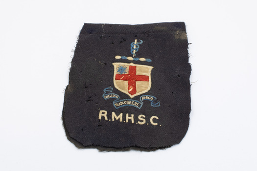 Front of hospital badge showing Royal Melbourne Hospital logo