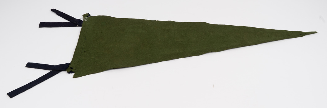 Back view of school flag made of dark green felt with two textile ties at the end of the flag.