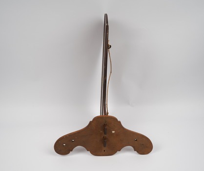 Upside down and side view of wooden rudder