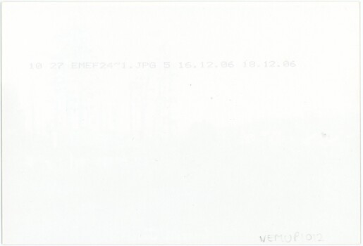 The reverse of a photograph, containing technical information and an accession number.