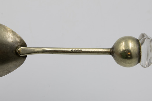 Close-up of neck of salad serving fork