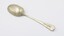 Serving spoon placed flat in prone position.