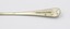 Underside of handle of spoon showing manufacturer marks