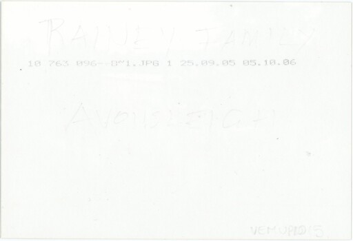 The reverse of a photograph, with handwritten annotations, printed technical information, and an accession number.