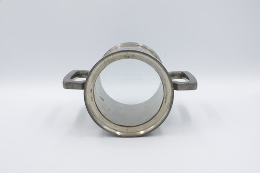 Trophy mug lying on side viewed from base which is transparent.
