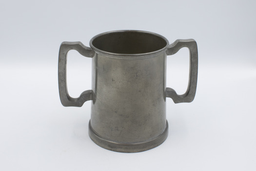 Back of upright trophy mug