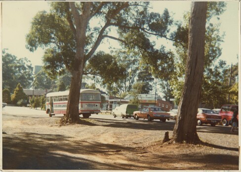 A colour photograph of a busy street.