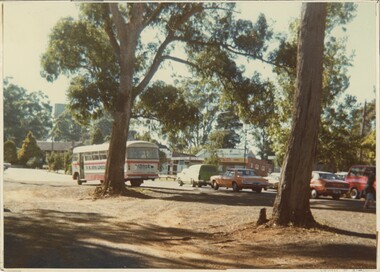 A colour photograph of a busy street.