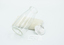 Small milk bottle with separate pressed metal lid and note.