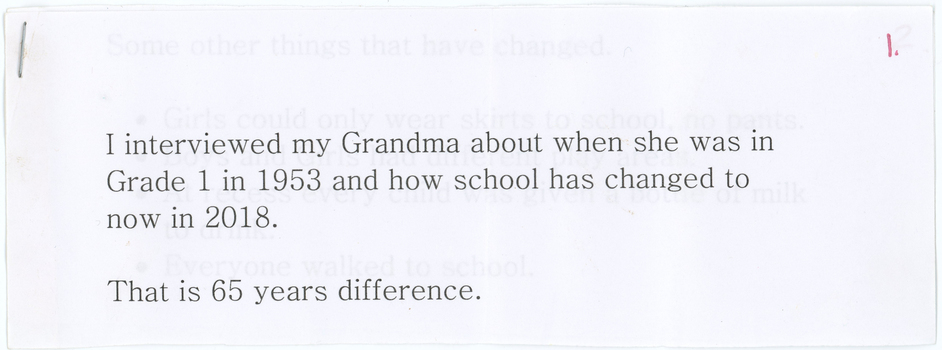 A printed explanatory note, folded in the top-left corner and with a '2' in the top-right
