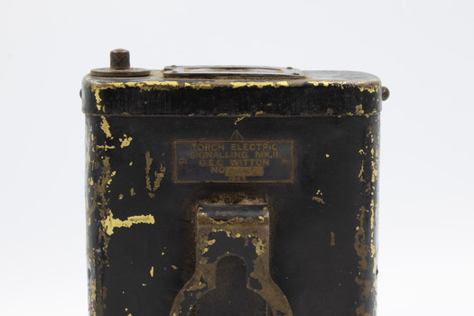 Image of small inscription plate on reverse of lamp