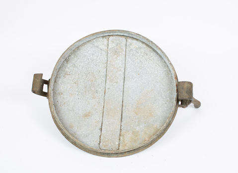 Underside of sanitary can.