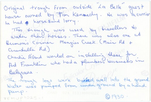 The reverse of a printed photograph with Fujifilm logos and extensive handwritten annotation in blue pen.