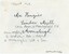 The reverse of a printed photograph, with significant handwritten annotation in pen and pencil. 