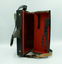 Camera case standing on its side and opened