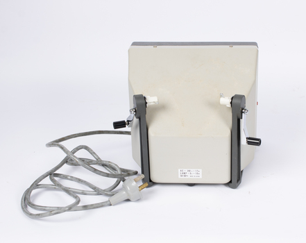 Underneath view of movie editor with power cord