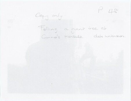 White paper with handwritten text in pencil; the photograph on the other side of the paper is somewhat visible.