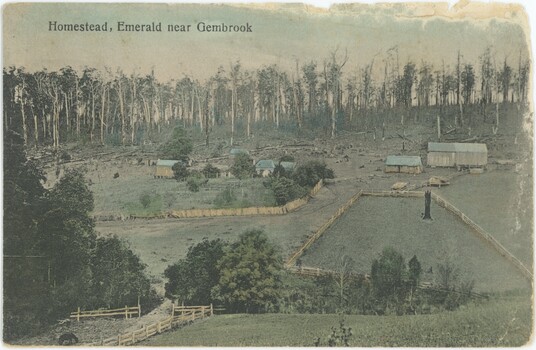 The image-side of a postcard, with an artificially hand-coloured photograph.