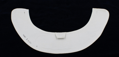 Back of nurse collar (1/2) showing inscription and tag.