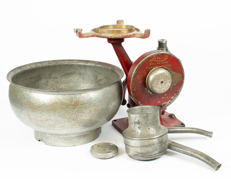 Cream separator with parts including bowl and output pipe