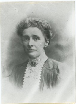 Black and white studio photograph - head and shoulders