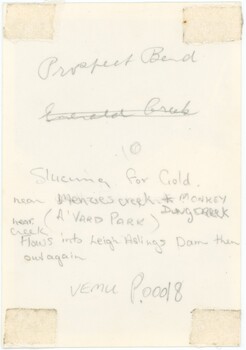 The reverse of a photograph with handwritten annotations and the accession number.