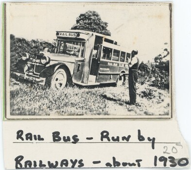 A black and white photograph of a bus, attached to annotated card.