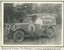 A black and white photograph of a man and a boy standing beside a truck; a handwritten annotation is below the photograph.