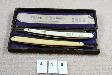 Box open. Two razors inside box.
