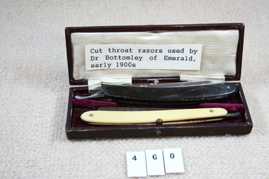 Opened box showing two razors.