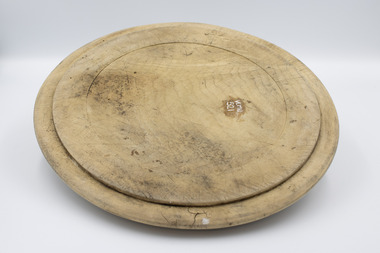 Round wooden bread board