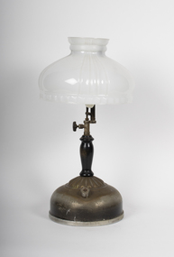 metal lamp with white glass hood
